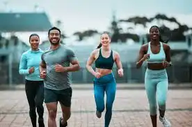 image of man and 3 women doing cardio exercise Aldershot to help tone and remove fat from the body.