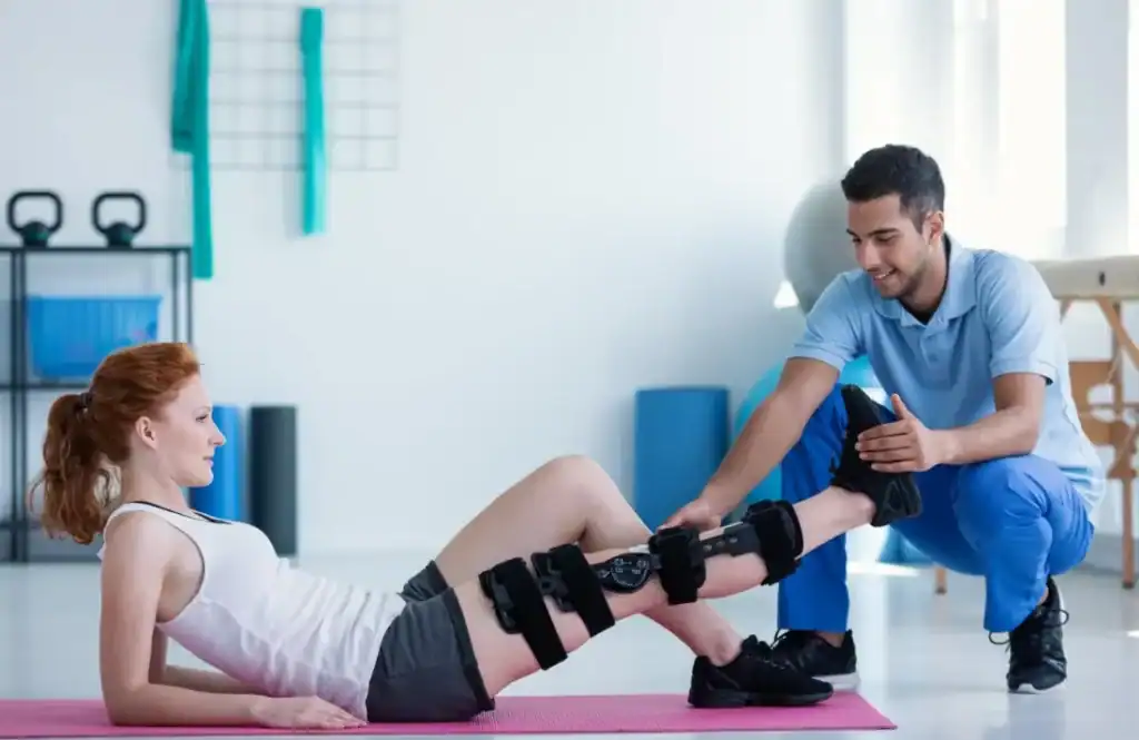 Woman having treatment to help muscle recovery Aldershot after an injury