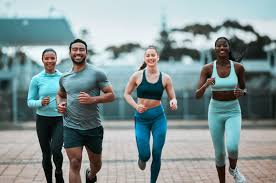 image of people running to incorporate cardio Aldershot exercise into their life to help tone arms and body.